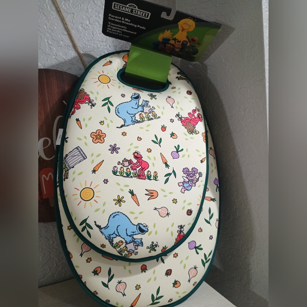Sesame Street Cream Bib with Colorful Characters
